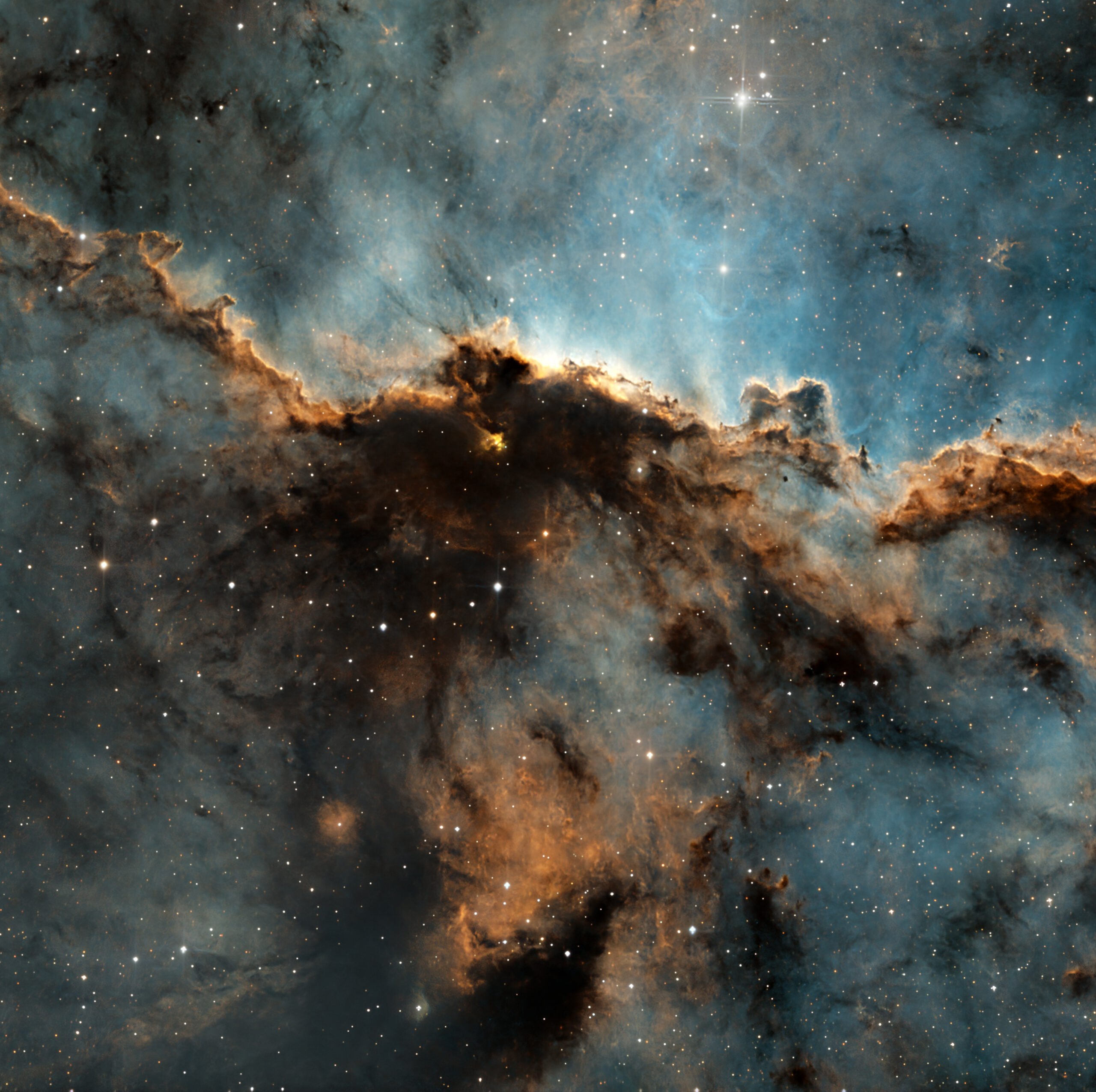 Nebula dark dusty intertwined against a blue background